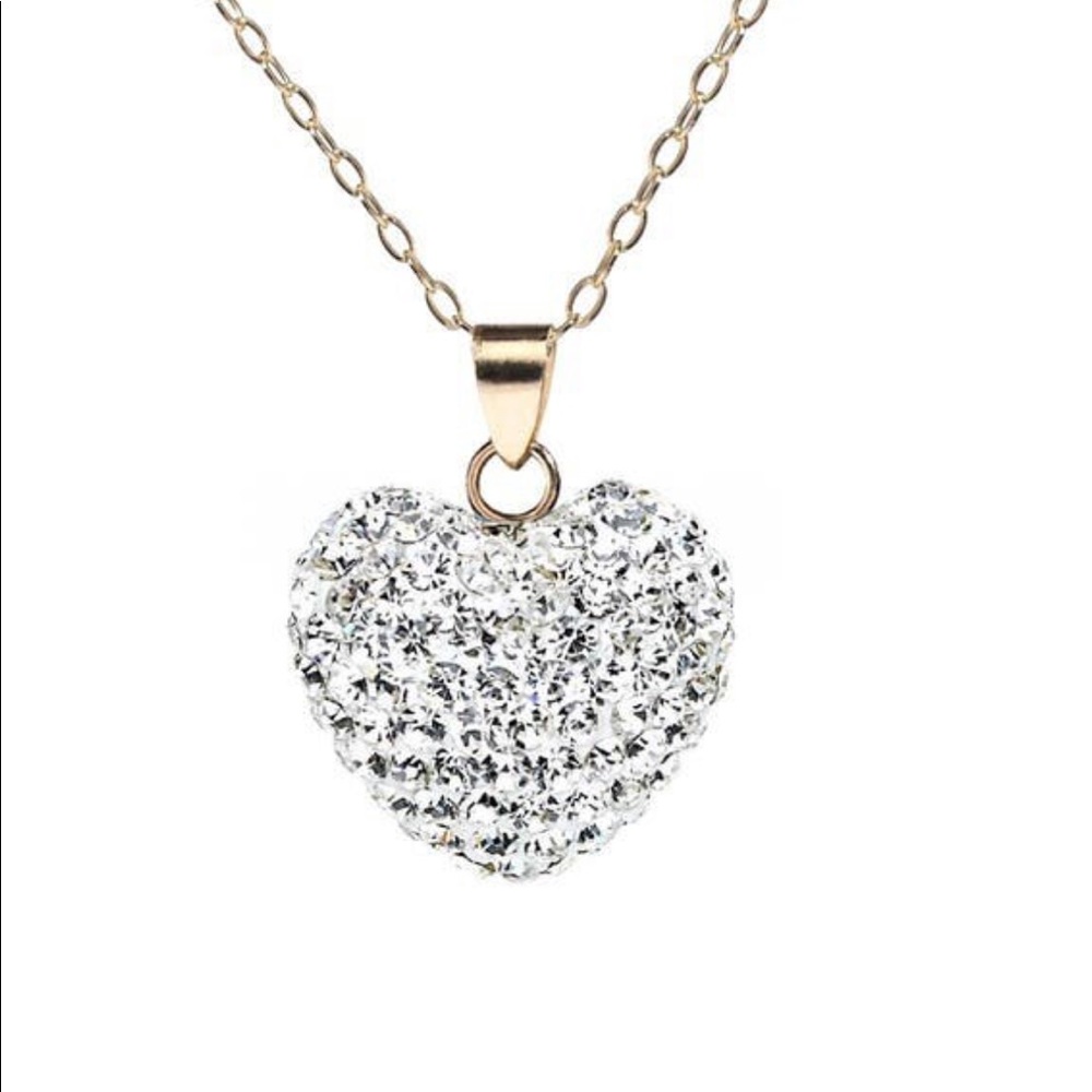 A Valentine Heart💘covered in Swarovski crystals on 18” Sterling Silver Chain.